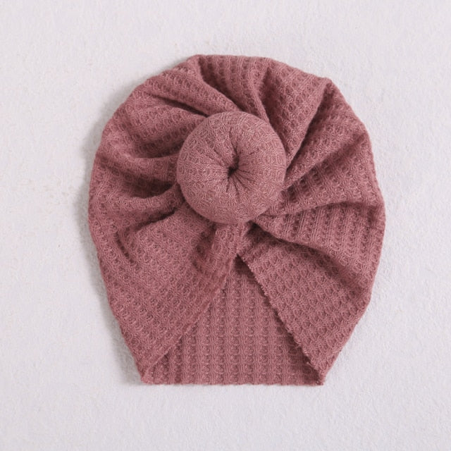 Blush pink donut hat/turban hat for reborn baby girls or newborn babies. Fit newborns up to age 3.