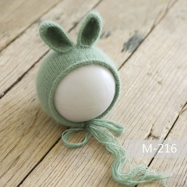 Sage green light green knit knitted mohair bunny bonnet hat for newborn photography reborn dolls cuddle babies reborns.