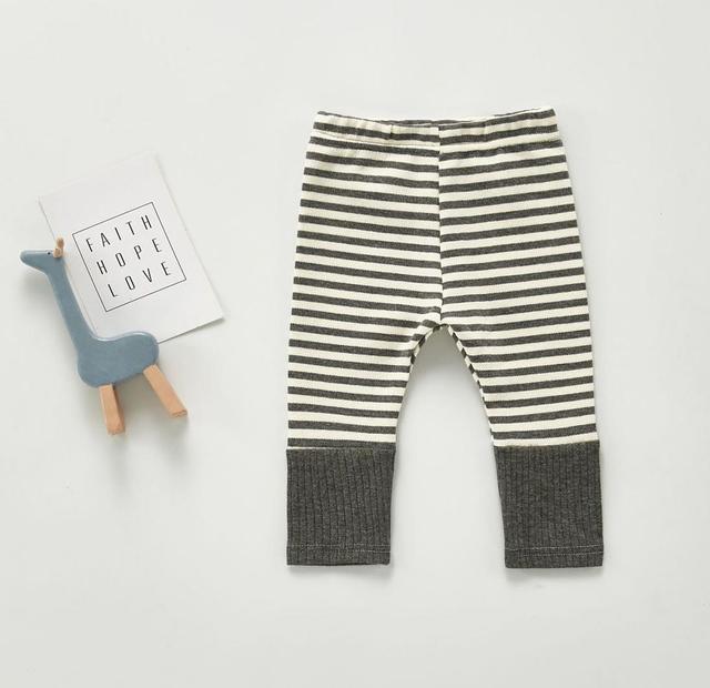 Grey and white gender neutral striped Scandinavian style baby leggings pants for reborns, baby girls, baby boys, silicone dolls and cuddle babies.