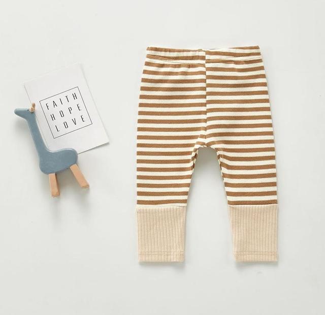 Tan light brown and offwhite cream unisex gender neutral striped Scandinavian style baby leggings pants for reborns, baby girls, baby boys, silicone dolls and cuddle babies.